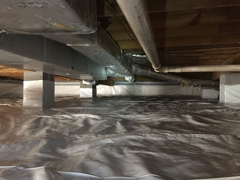 Short Encapsulated Crawl Space with Ductwork After Soda Blasting for Mold