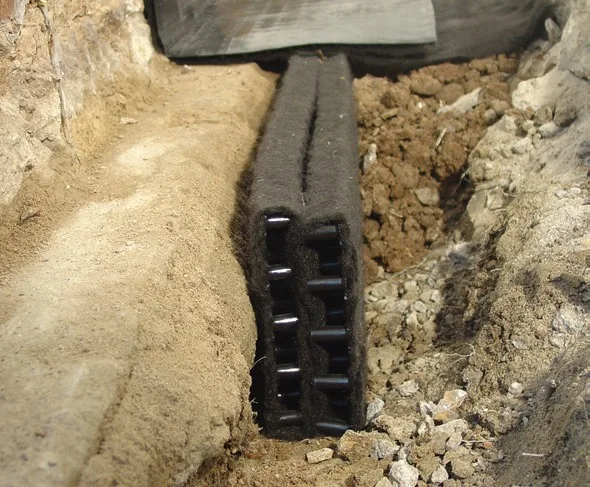 Image of the Hydraway basement waterproofing beside the footing